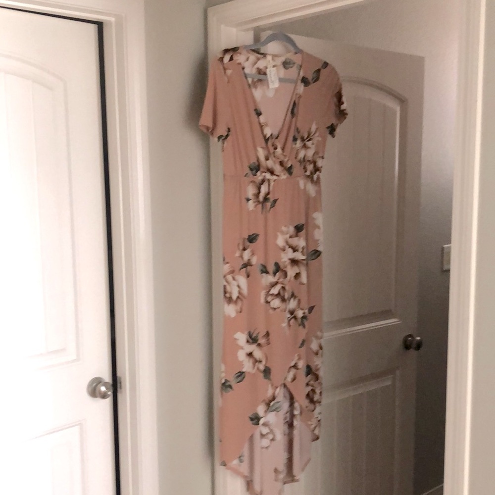 Beautiful hi low dress. Brand new, never worn.